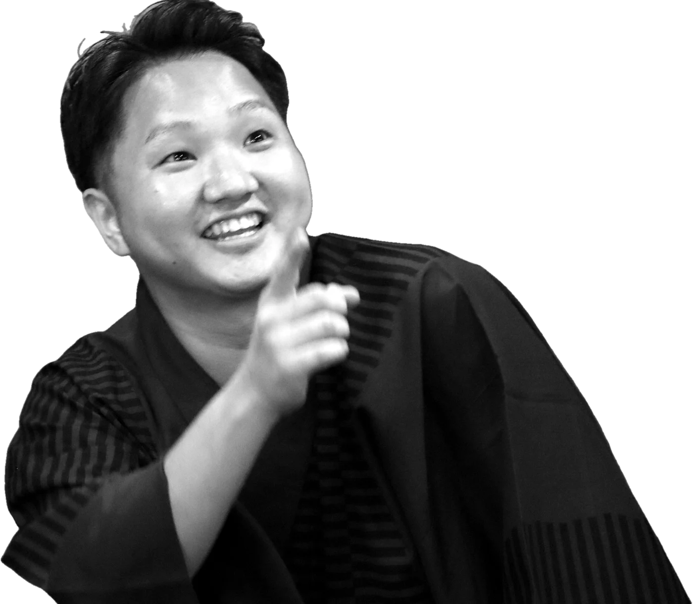 笑いながらこちらを指さす代表