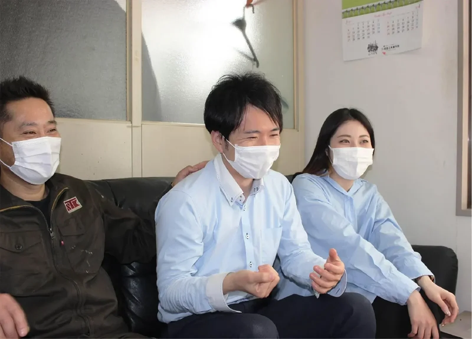 笑顔で話す田倉精機の3名